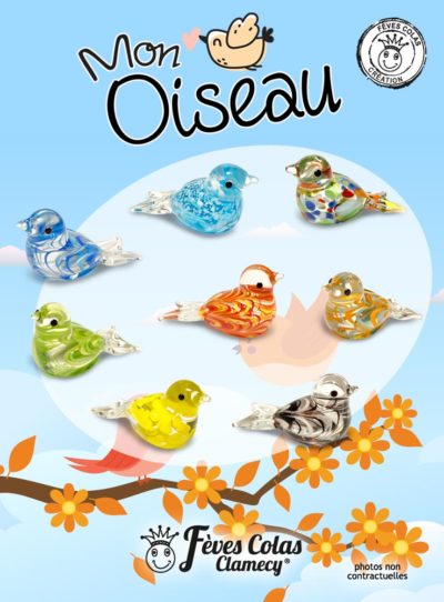 Collection de 8 fèves en verre, translucides et colorées en forme d'oiseaux. Artisan Français.